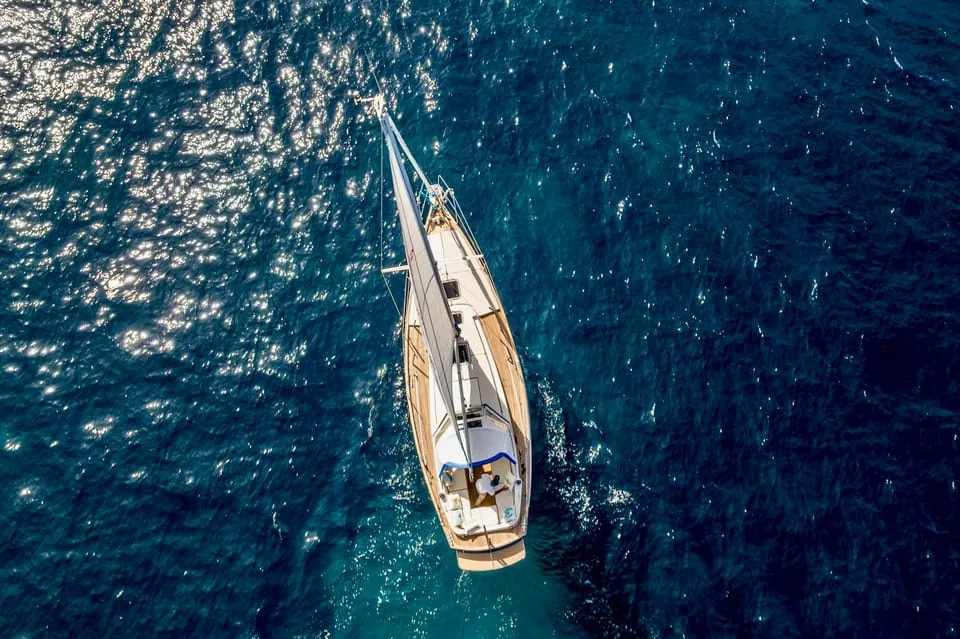 Sailing boat crossing the Maddalena archipelago